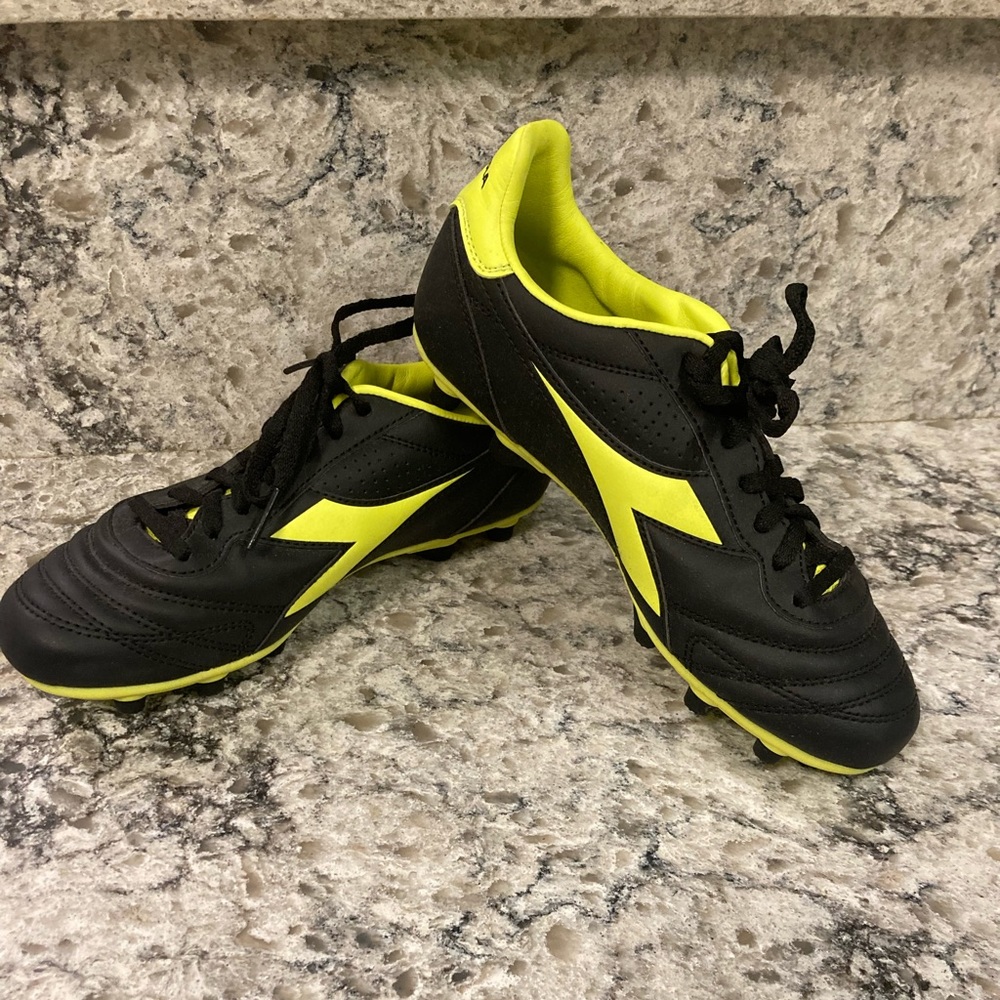 Size 36 Diadora womens cleats. Black and neon yellow.